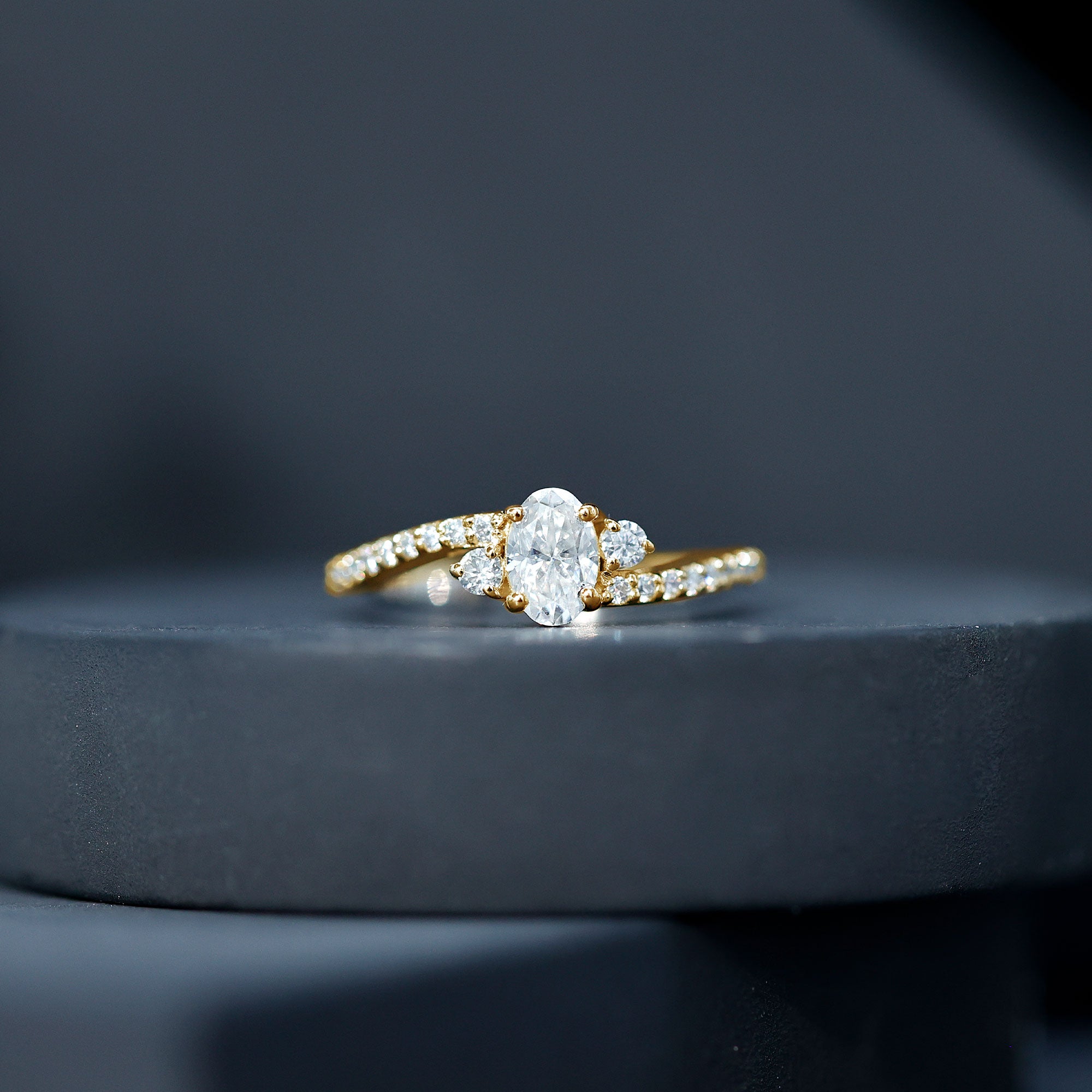 Oval Shape Moissanite Bypass Engagement Ring with Side Stones